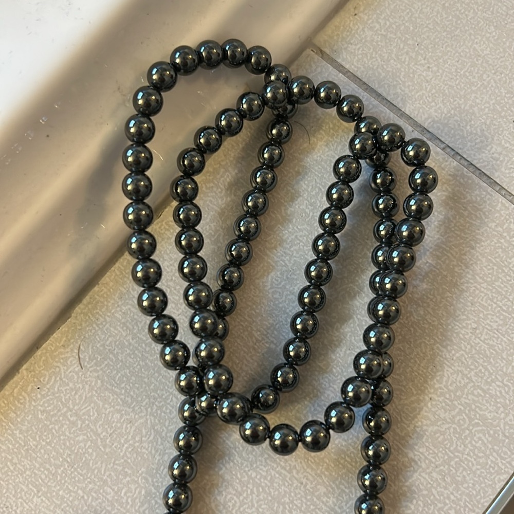 Long hematite bead strand necklace